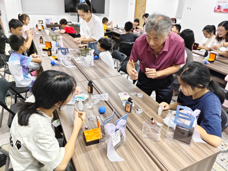 新海街道开展“我在新时代文明实践中心体验特色文化”主题活动的图片 (3).jpg